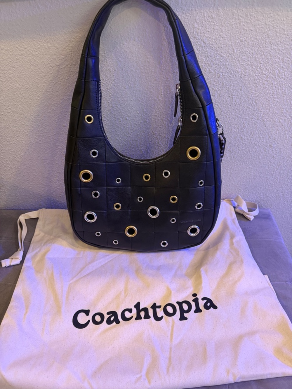 Coach Black Leather Shoulder Bag with Mixed Metal Eyelets